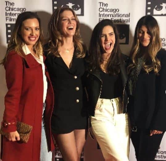 Sarah Brooks posing on the red carpet with her fellow Chicago Med co-stars. How much salary does Sarah get paid per episode?